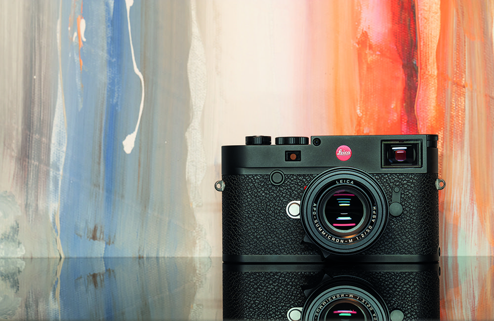 Leica M10-R in front of a Canvas Painting